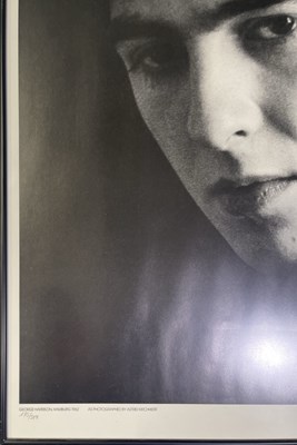 Lot 318 - THE BEATLES - ASTRID KIRCHHERR SIGNED PORTRAIT PHOTO OF GEORGE HARRISON.