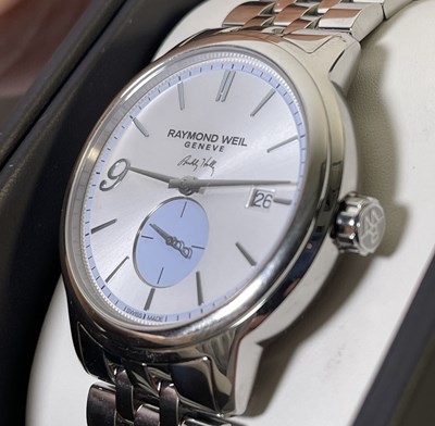 Lot 408 - RAYMOND WEIL - COLLECTABLE BUDDY HOLLY WATCH.