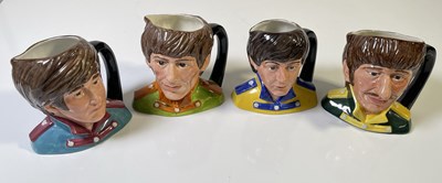 Lot 232 - THE BEATLES - ROYAL DOULTON TOBY JUGS.