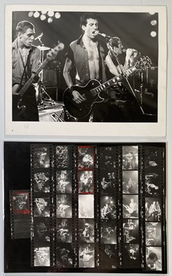 Lot 2420551 - THE CLASH - HAMMERSMITH PALAIS VINTAGE PHOTO PRINT AND CONTACT SHEET.