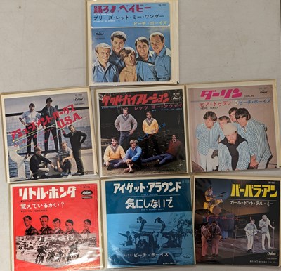 Lot 104 - THE BEACH BOYS - JAPANESE 7" PACK (ALL TRANSPARENT RED VINYL)