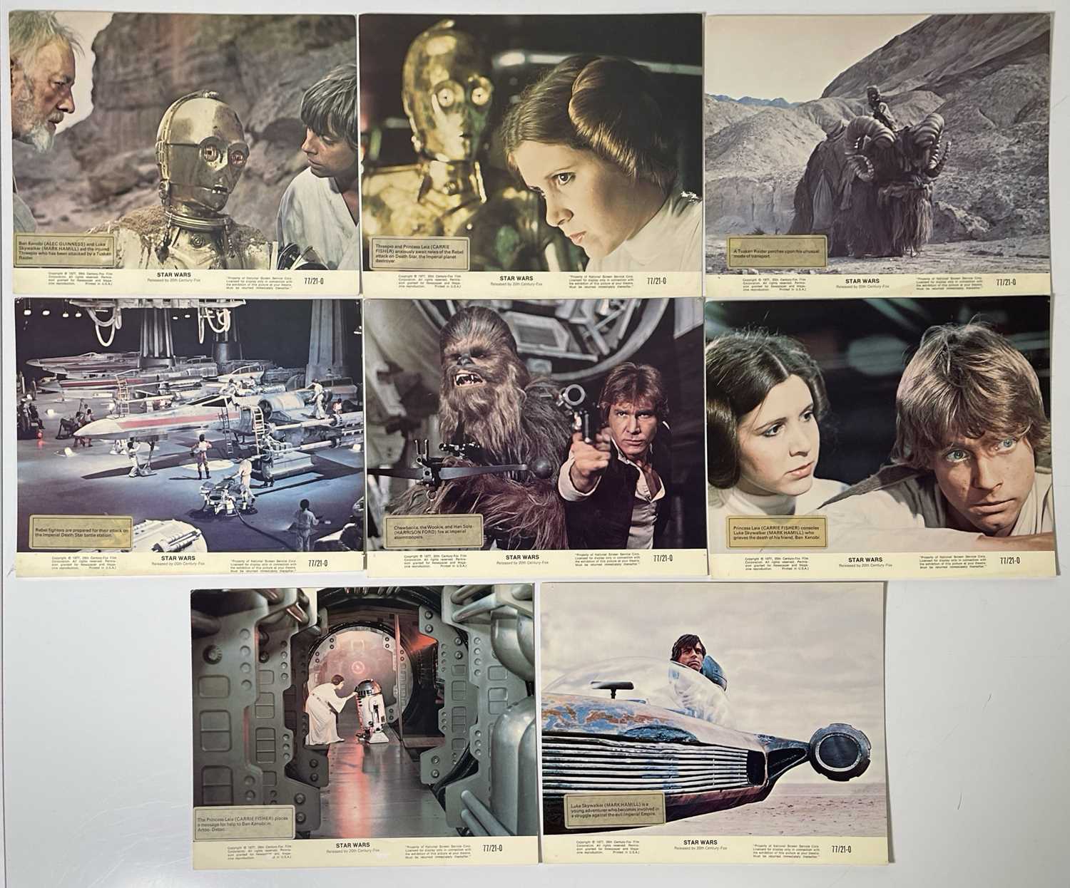 A complete set of eight original 1977 Star Wars lobby cards arranged for auction.