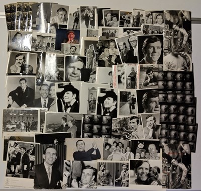 Lot 310 - NORMAN WISDOM - LARGE COLLECTION OF PRESS PHOTOGRAPHS.