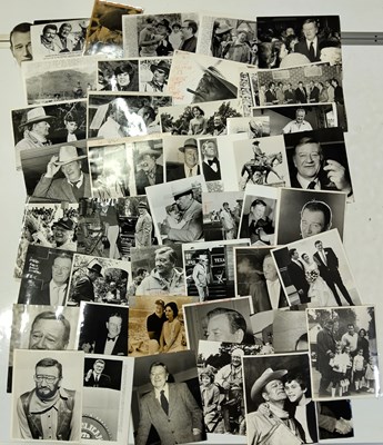 Lot 320 - JOHN WAYNE - LARGE COLLECTION OF PRESS PHOTOGRAPHS.