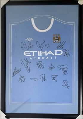 Lot 417 - FOOTBALL MEMORABILIA - MANCHESTER CITY SIGNED SHIRT IN FRAMED DISPLAY.