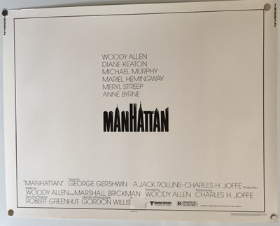 Lot 1420102 - MANHATTAN / THE SHINING POSTERS. TWO MODERN PRINTS OF POSTERS, BOTH ON THICK STOCK/CARD.