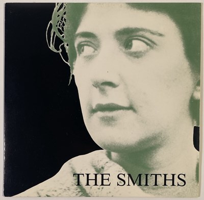 Lot 24 - THE SMITHS - GIRLFRIEND IN A COMA 7" (ORIGINAL UK MISPRINT - RT 197)