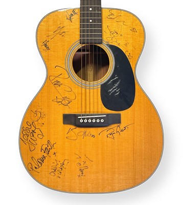 Lot 588 - U2 / QUEEN INTEREST - A MARTIN GUITAR SIGNED BY STARS INC BONO / ROGER TAYLOR / ED SHEERAN / GUY GARVEY / ONE DIRECTION.