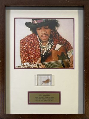 Lot 443 - JIMI HENDRIX - PRESENTATION WITH WOOD SHAVINGS FROM A 1967 HENDRIX OWNED GUITAR.