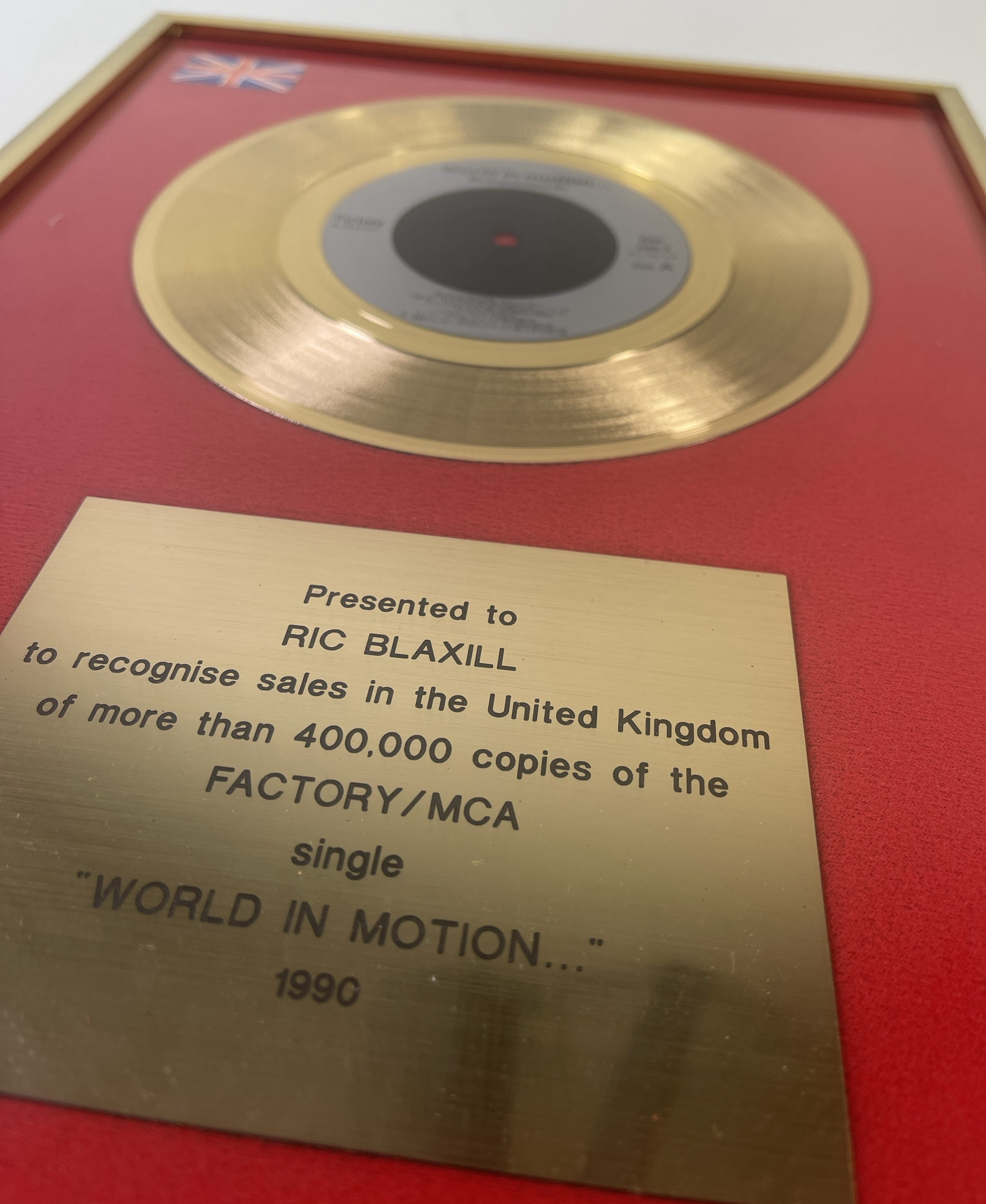Lot 478 - NEW ORDER - OFFICIAL GOLD DISC FOR 'WORLD IN