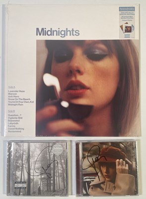 Lot 269 - TAYLOR SWIFT - SIGNED CDS / SIGNED SEALED COPY OF 'MIDNIGHTS'.