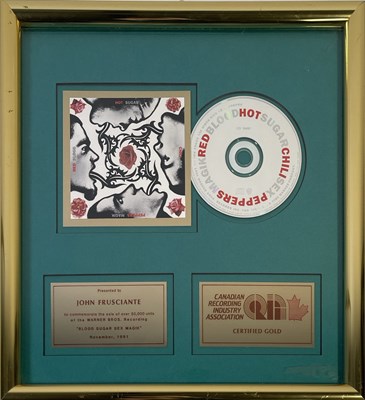 Lot 316 - THE RED HOT CHILI PEPPERS - CRIA AWARD PRESENTED TO JOHN FRUSCIANTE.