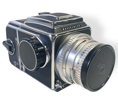 Lot 589 - MARTYN GODDARD - THE HASSELBLAD 500CM CAMERA KIT THAT SHOT THE JAM / AC/DC / U2 - WITH FOUR LIMITED EDITION PRINTS.