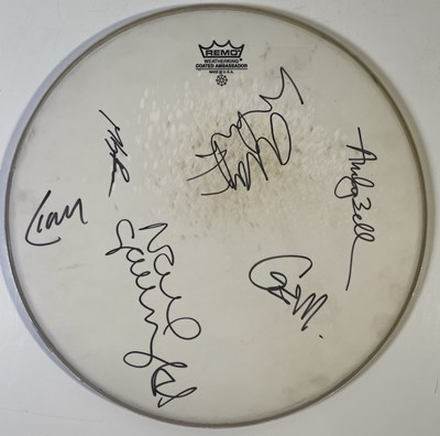 Lot 518 - OASIS - A FULLY SIGNED DRUM SKIN.