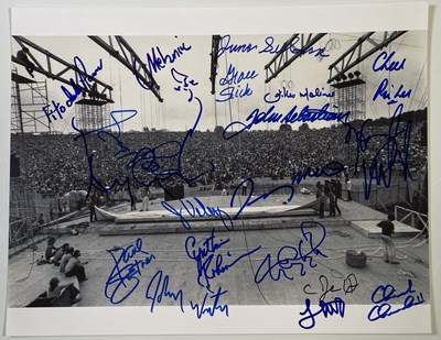 Lot 290 - WOODSTOCK - MULTI-SIGNED PANORAMA PHOTO SIGNED BY 20 PERFORMERS.