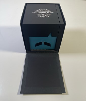 Lot 162 - THE BEATLES - RAYMOND WEIL SGT, PEPPER'S WATCH IN ORIGINAL BOX AND PACKAGING.