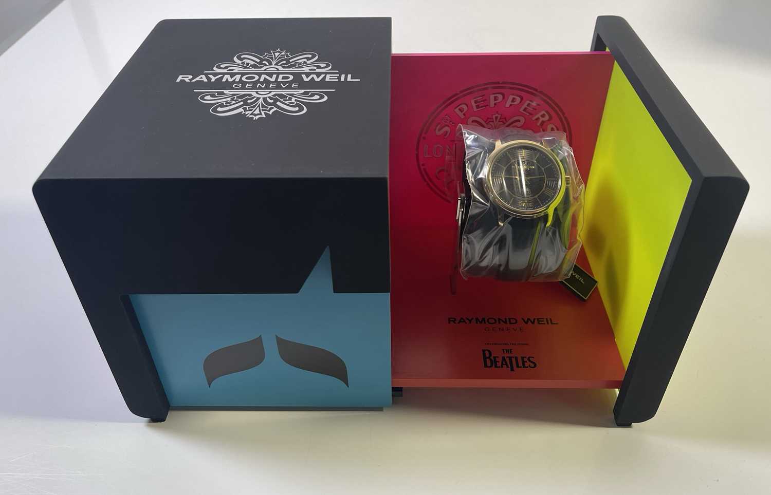 Lot 162 - THE BEATLES - RAYMOND WEIL SGT, PEPPER'S WATCH IN ORIGINAL BOX AND PACKAGING.