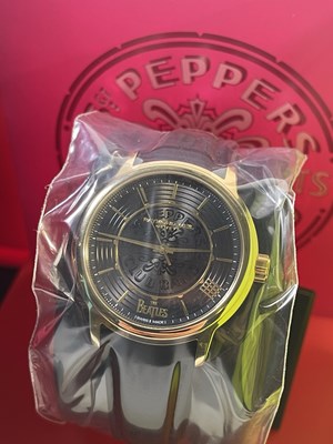 Lot 162 - THE BEATLES - RAYMOND WEIL SGT, PEPPER'S WATCH IN ORIGINAL BOX AND PACKAGING.