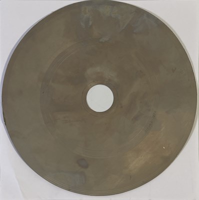 Lot 40 - THE BEATLES - THE BEATLES CHRISTMAS RECORD 7" METAL STAMPER (LYN 492-1U)