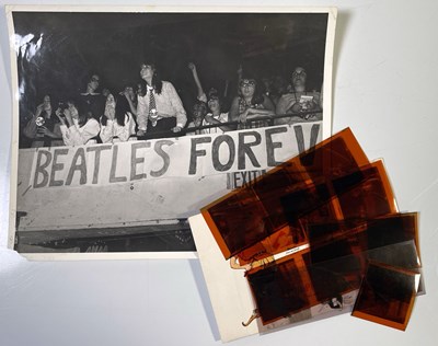 Lot 261 - THE BEATLES - ORIGINAL PHOTO NEGATIVES WITH COPYRIGHT FROM THE 1966 CINCINNATI CONCERT.