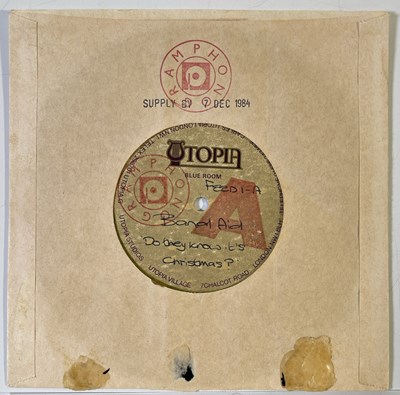 Lot 557 - BAND AID / LIVE AID - ORGINAL ACETATE AND LIVE AID MEMORABILIA.