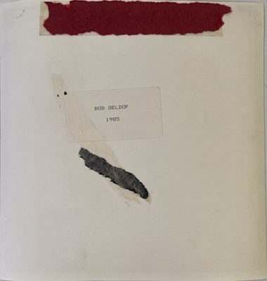 Lot 557 - BAND AID / LIVE AID - ORGINAL ACETATE AND LIVE AID MEMORABILIA.