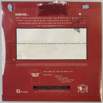 Lot 557 - BAND AID / LIVE AID - ORGINAL ACETATE AND LIVE AID MEMORABILIA.