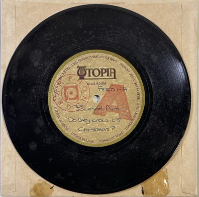 Lot 557 - BAND AID / LIVE AID - ORGINAL ACETATE AND LIVE AID MEMORABILIA.