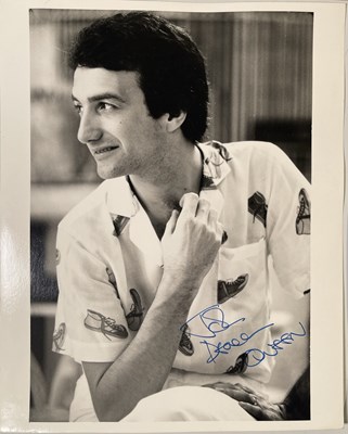 Lot 462 - QUEEN - FOUR SIGNED PHOTOGRAPHS INC FREDDIE MERCURY.