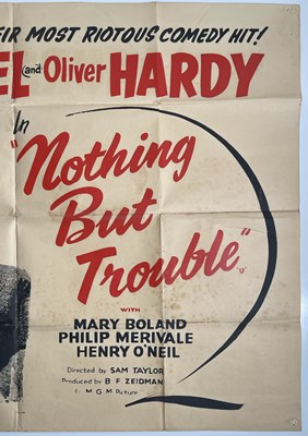 Lot 95 - LAUREL AND HARDY - NOTHING BUT TROUBLE (1944) - UK QUAD POSTER.