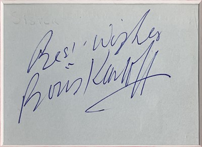 Lot 61 - BORIS KARLOFF - SIGNED PAGE IN MOUNTED DISPLAY.