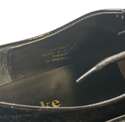Lot 33 - PEAKY BLINDERS - PACKY LEE AS JOHNNY DOGS - LIKELY SCREEN WORN PATENT LEATHER LOAFERS.