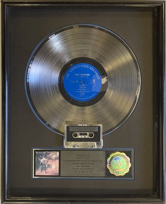 Lot 273 - OZZY OSBOURNE RIAA AWARD AND SIGNED PHOTO.