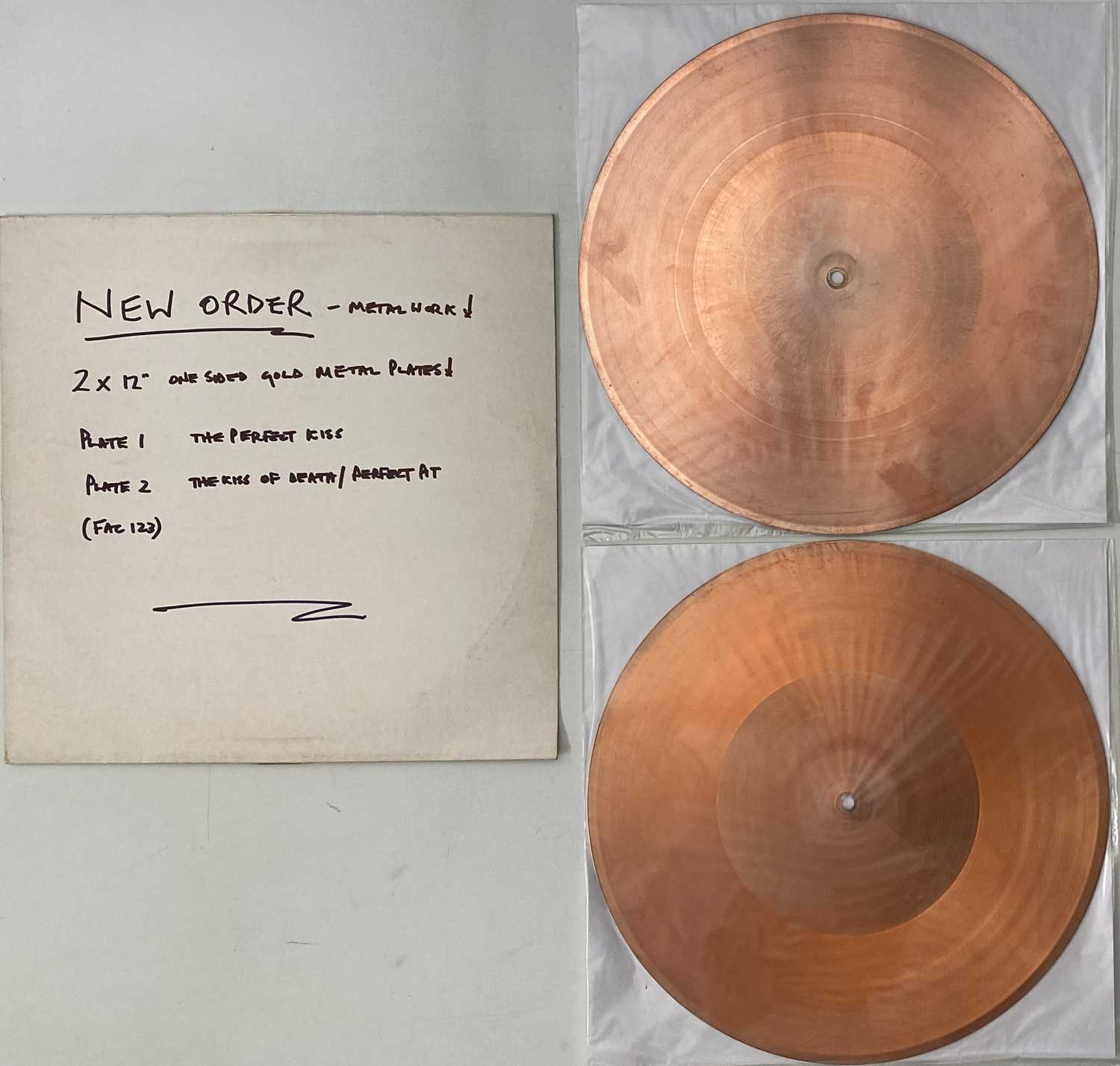 Lot 182 - NEW ORDER - THE PERFECT KISS 12" (FAC 123 - GOLD METAL WORK PLATES)