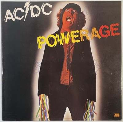Lot 209 - AC/DC - COPY OF POWERAGE SIGNED TO FRONT AND BACK OF SLEEVE.