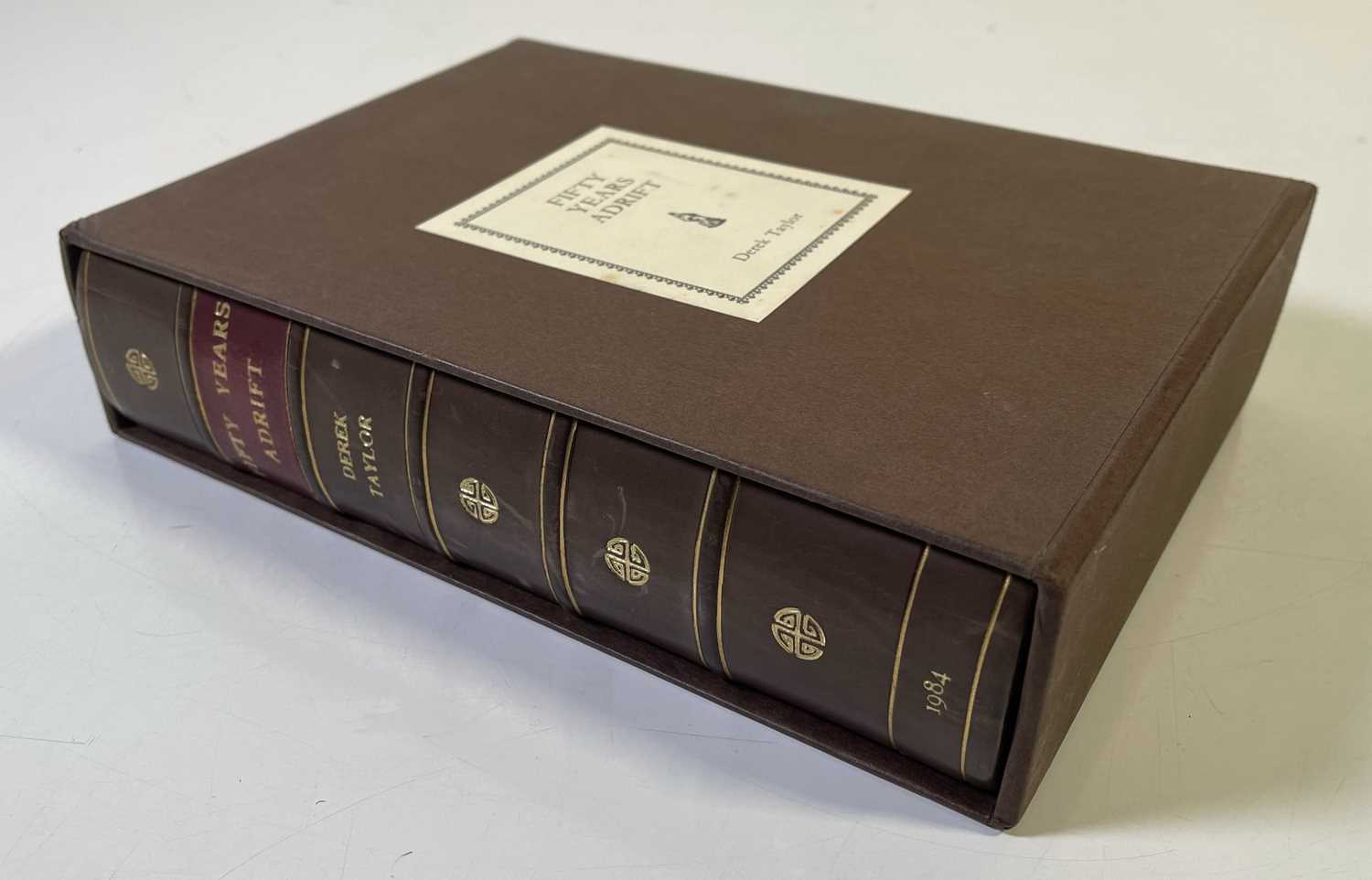 Lot 489 - DEREK TAYLOR / GEORGE HARRISON SIGNED - FIFTY YEARS ADRIFT GENESIS PUBLICATIONS.