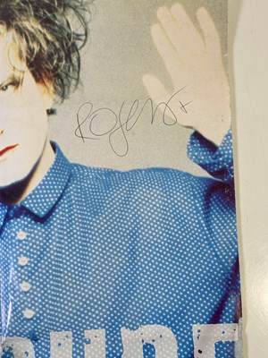 Lot 368 - THE CURE - POSTER SIGNED BY ROBERT SMITH.