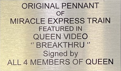 Lot 555 - QUEEN - PENNANT FLAG USED IN THE BREAKTHRU VIDEO FULLY SIGNED BY THE BAND.