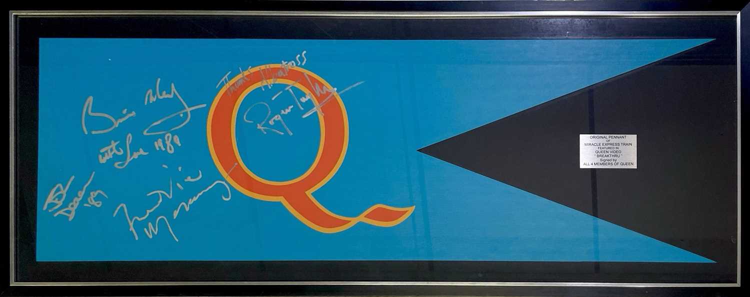 Lot 555 - QUEEN - PENNANT FLAG USED IN THE BREAKTHRU VIDEO FULLY SIGNED BY THE BAND.