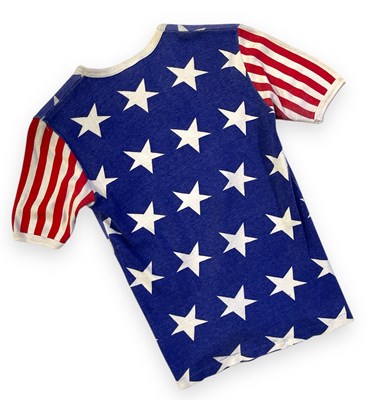 Lot 545 - QUEEN - A STARS AND STRIPES T-SHIRT OWNED AND WORN BY FREDDIE MERCURY.