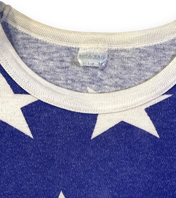 Lot 545 - QUEEN - A STARS AND STRIPES T-SHIRT OWNED AND WORN BY FREDDIE MERCURY.