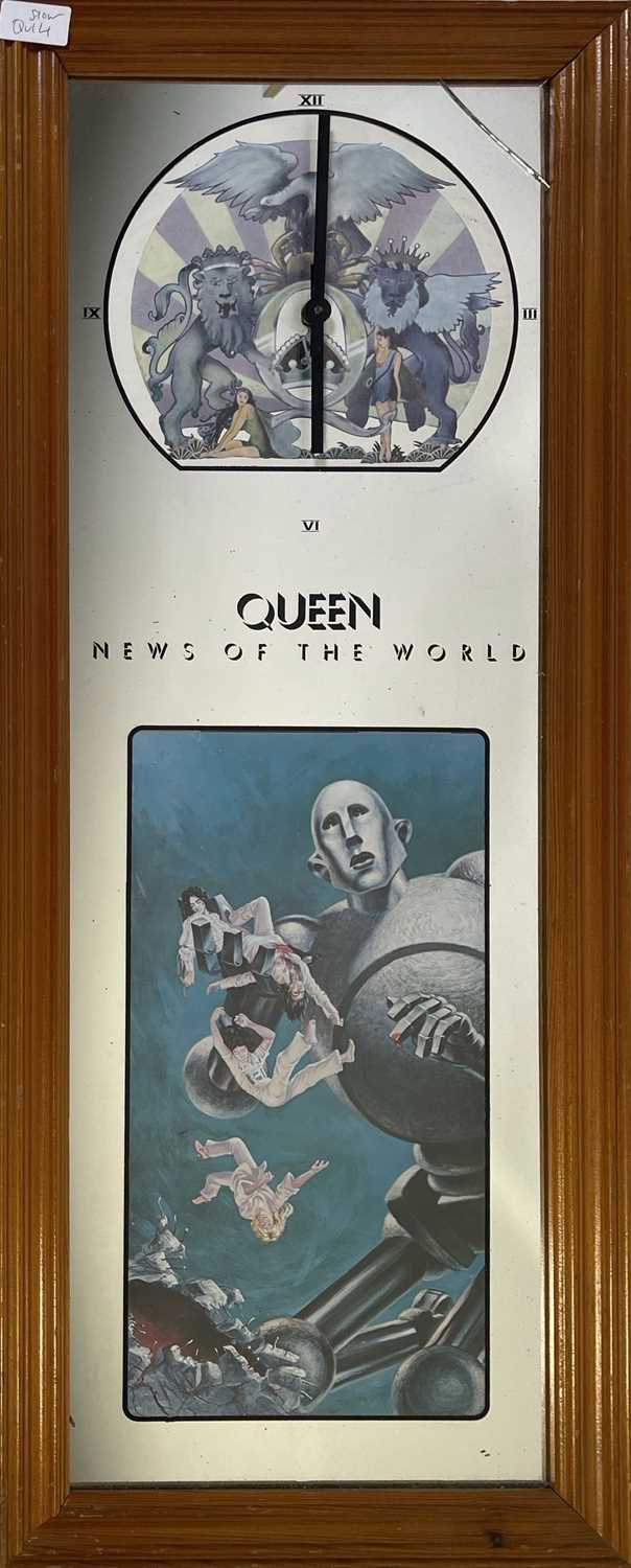Lot 554 - QUEEN - NEWS OF THE WORLD PROMOTIONAL MIRROR CLOCK.