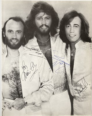 Lot 227 - BEE GEES SIGNED PAGE.