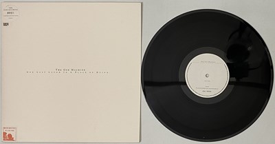 Lot 156 - THE GOD MACHINE - ONE LAST LAUGH IN A PLACE OF DYING LP (523 685-1 - ORIGINAL NUMBERED COPY)