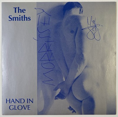 Lot 150 - THE SMITHS - MIKE JOYCE AND MORRISSEY SIGNED COPY OF 'HAND IN GLOVE'.