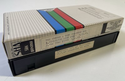 Lot 152 - THE SMITHS - VHS TAPES AND BADGES.