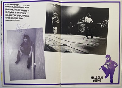 Lot 450 - AC/DC - SIGNED CONCERT PROGRAMME.