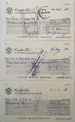 Lot 420 - QUEEN - A SET OF THREE C 1970S CHEQUES SIGNED BY THE BAND.