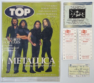 Lot 302 - METALLICA - SIGNED MAGAZINE COVER.