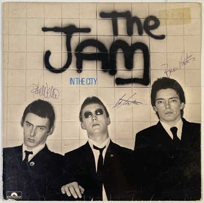 Lot 476 - THE JAM - SIGNED COPY OF 'IN THE CITY'.